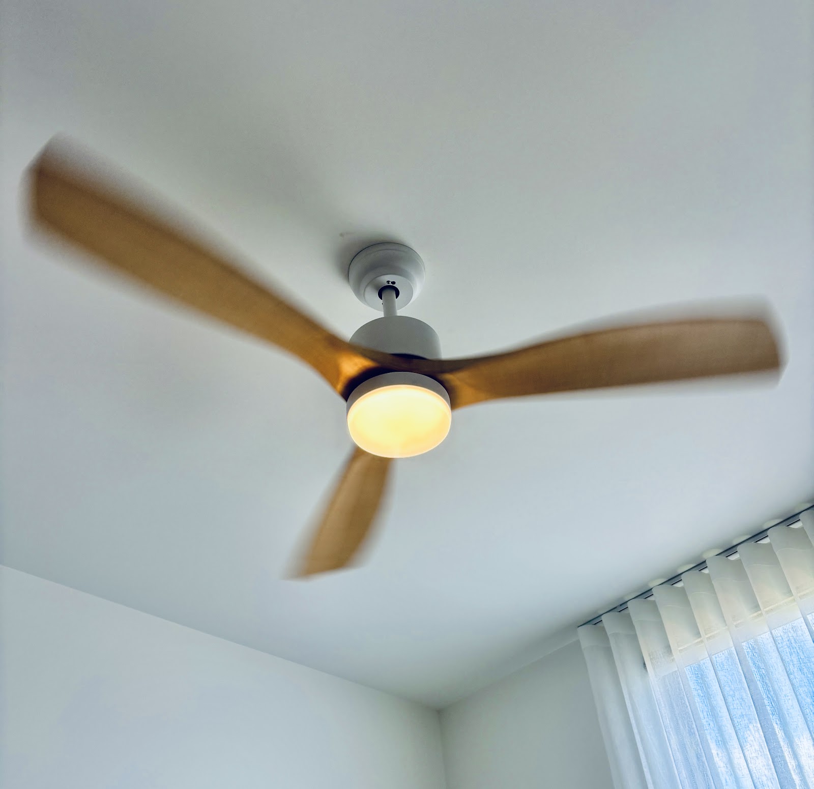 Timber blade ceiling fan with light
