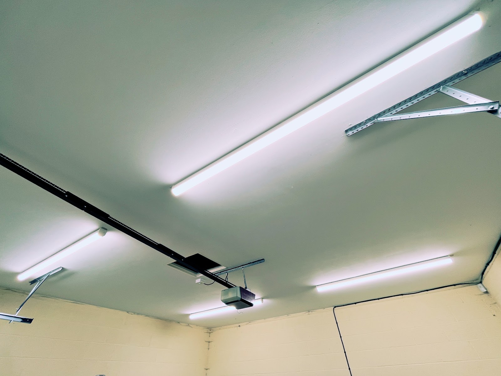 LED batten strip lights across a garage ceiling